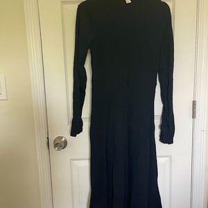 This is a black dress from H&M and the size is M.